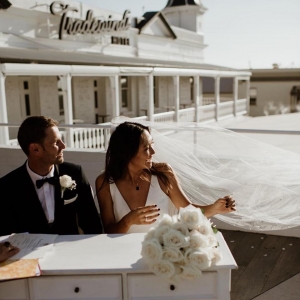 A bride and groom enjoying their wedding at Tradewinds Hotel